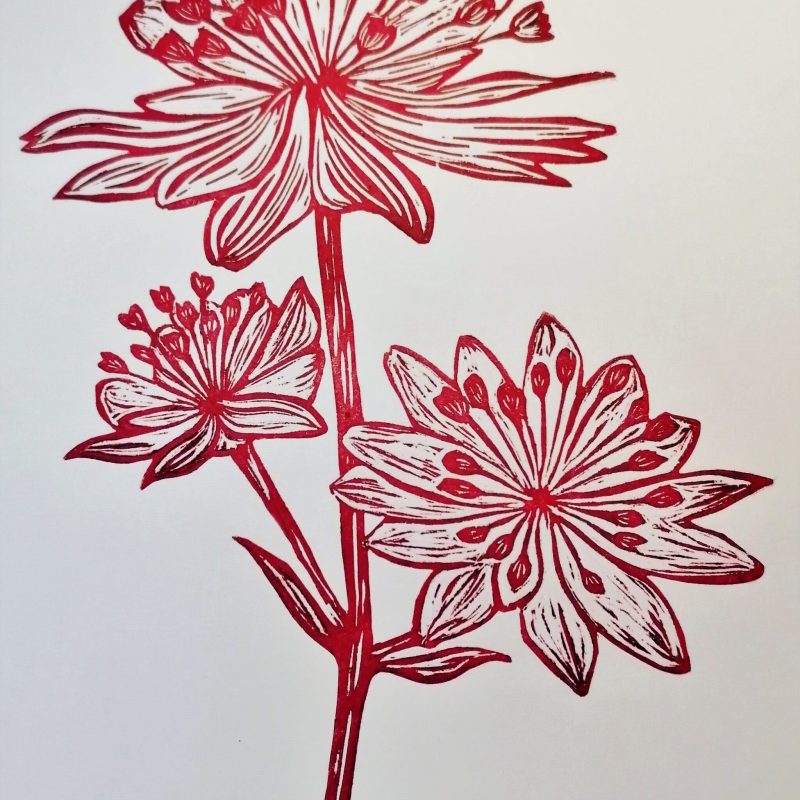 Linogravure en forme de fleur rouge